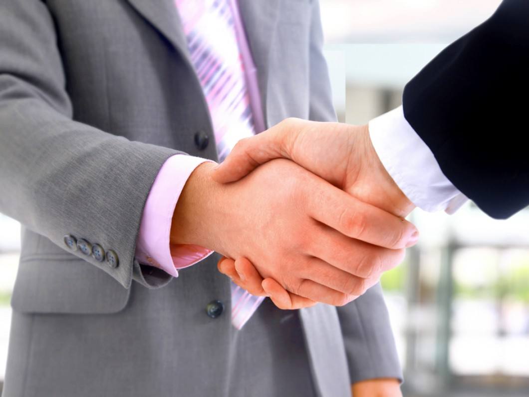 mergers and acquisitions handshake